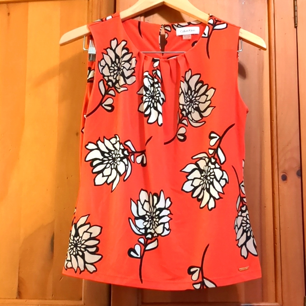 Calvin Klein floral blouse orange, black, and creme size small